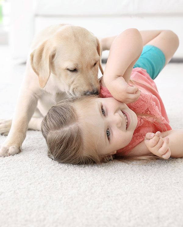 Mother and baby playing on a hardwood floor